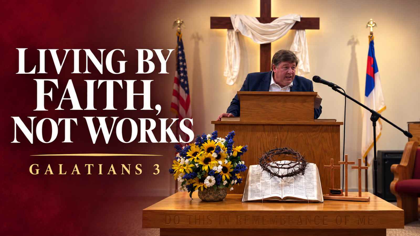 Pastor speaks at a wooden pulpit in a church, with a Bible and a crown of thorns on the table, flowers, and the banner ‘Living by Faith, Not Works’ (Galatians 3).